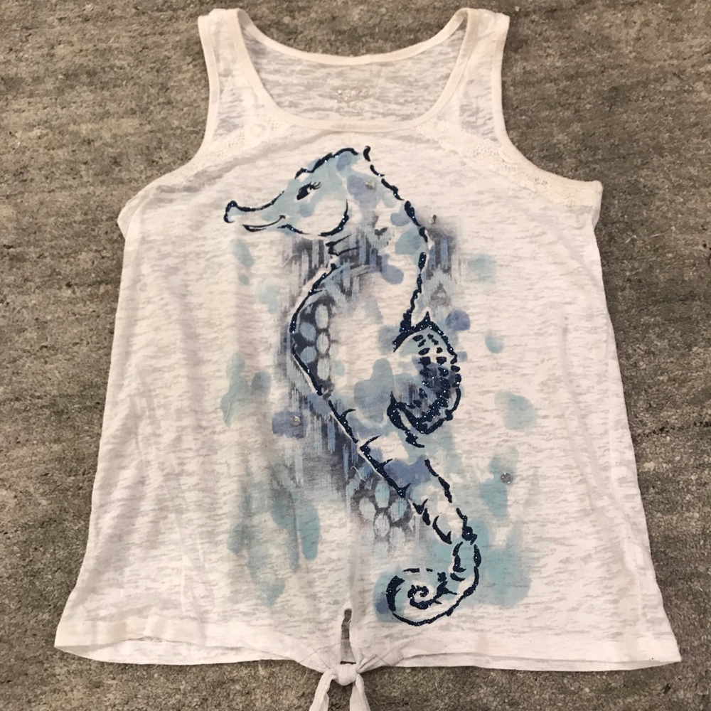 a blue seahorse top